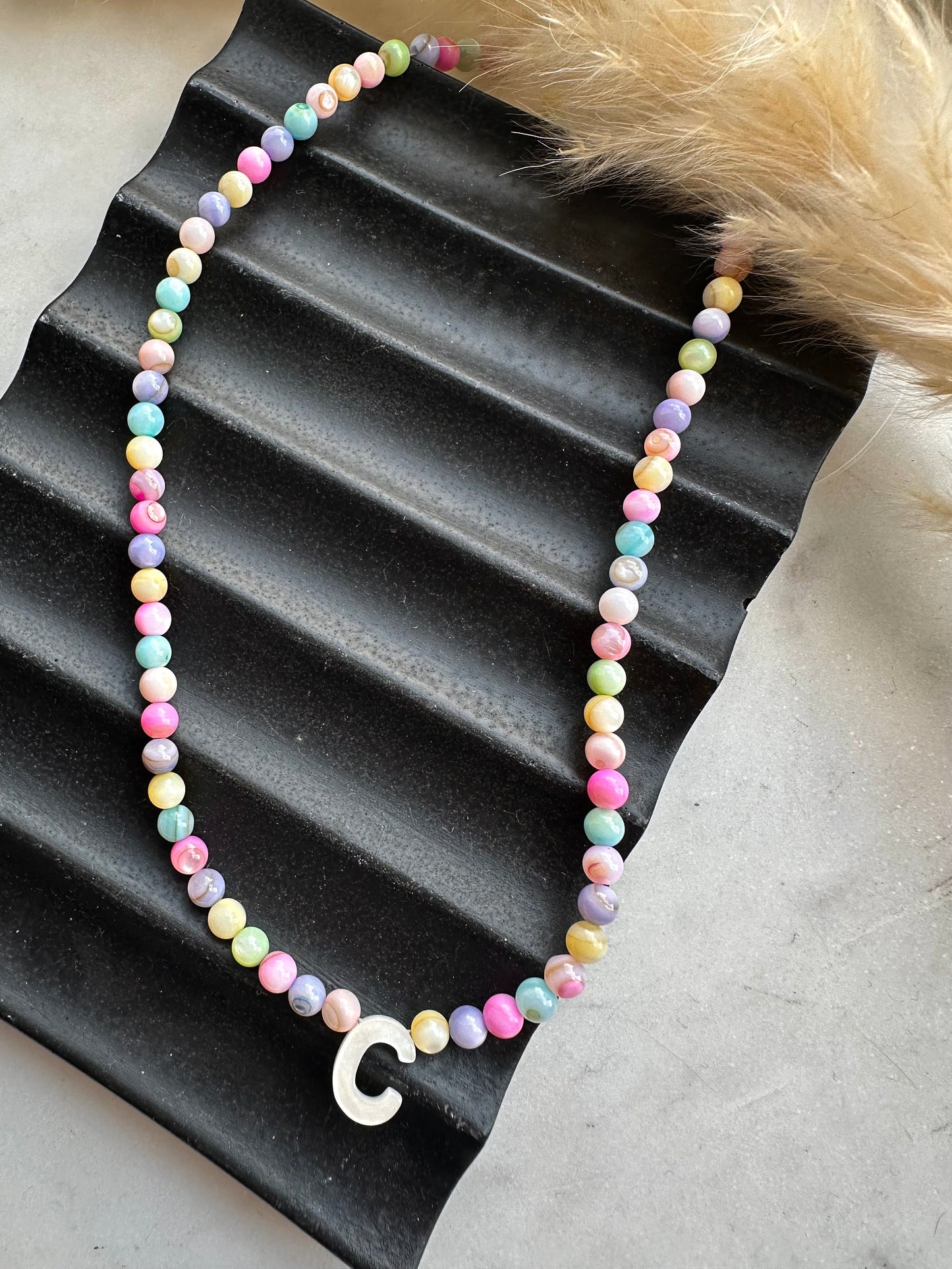 Pastel pearl rainbow initial
