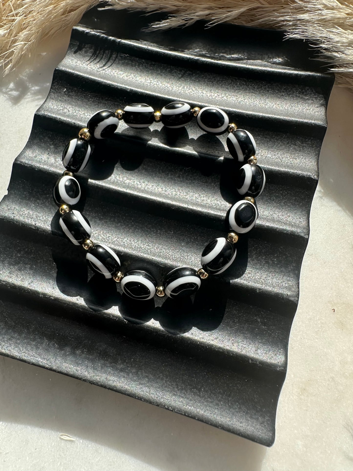 Luxe Oval Evil Eyes