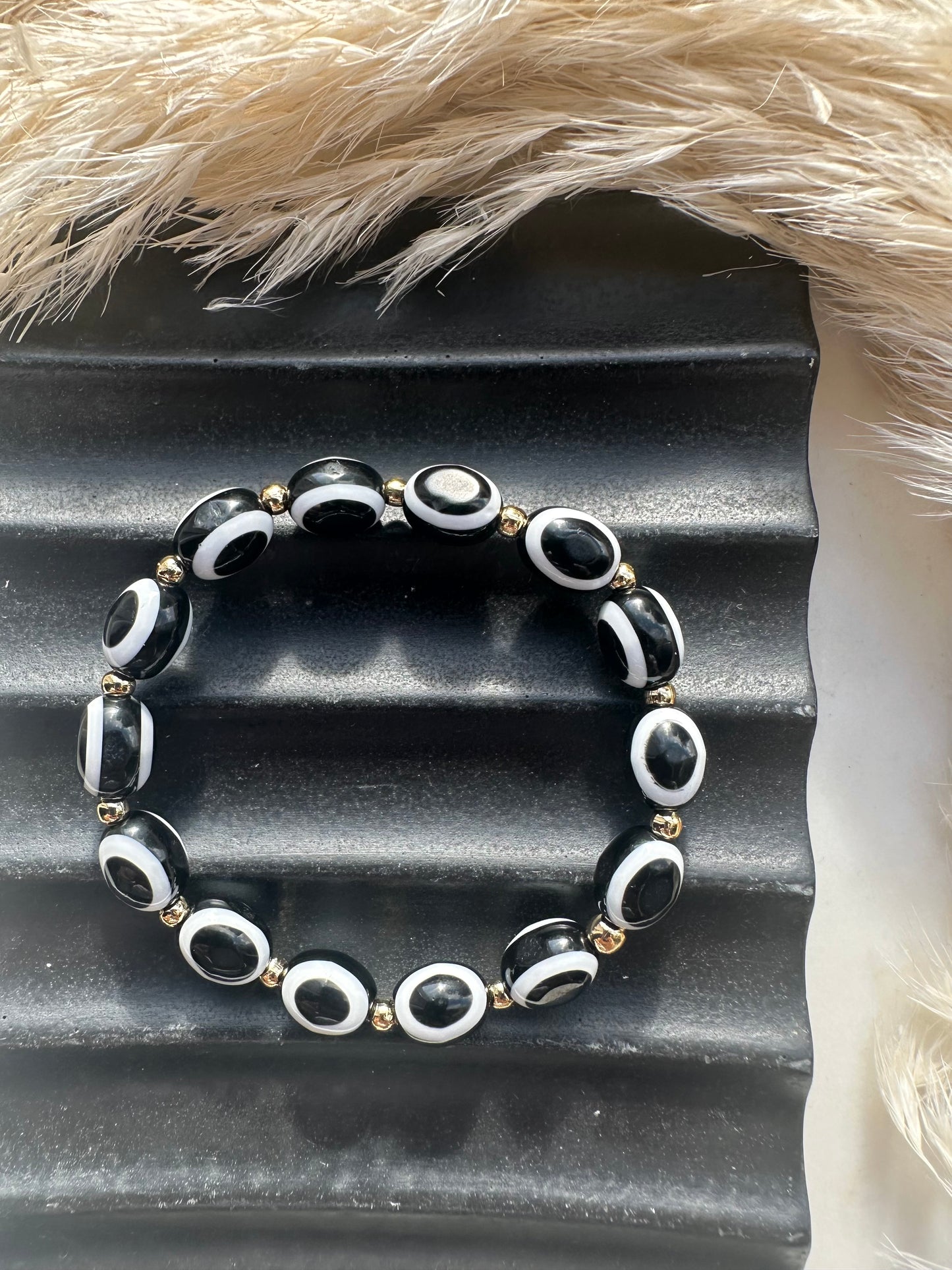 Luxe Oval Evil Eyes