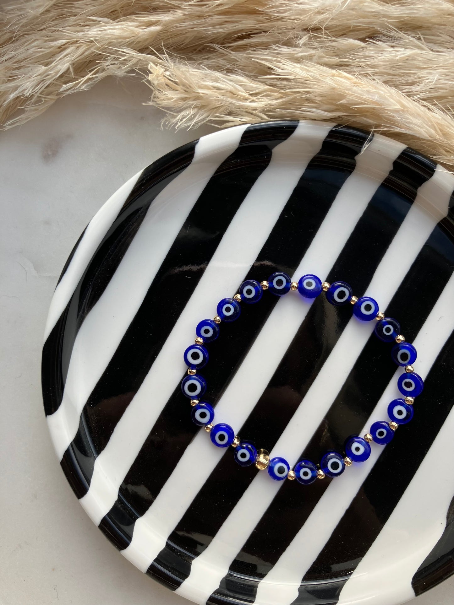 Evil eye stacker