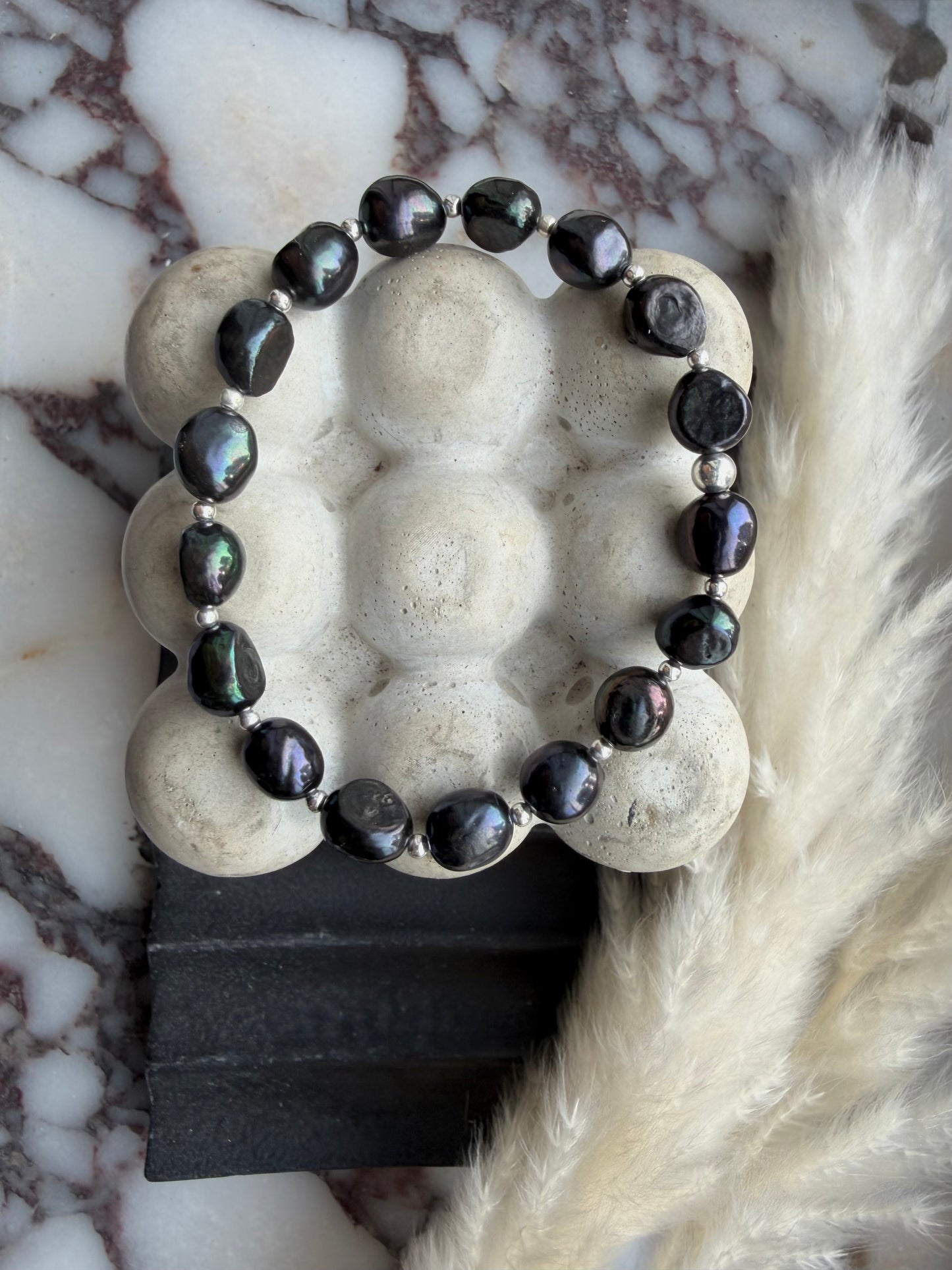 Peacock pearls