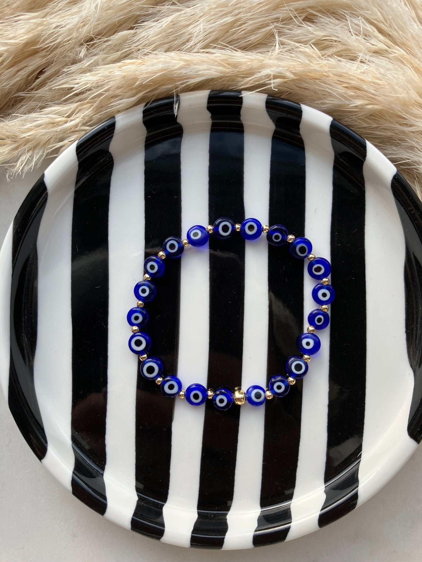 Evil eye stacker