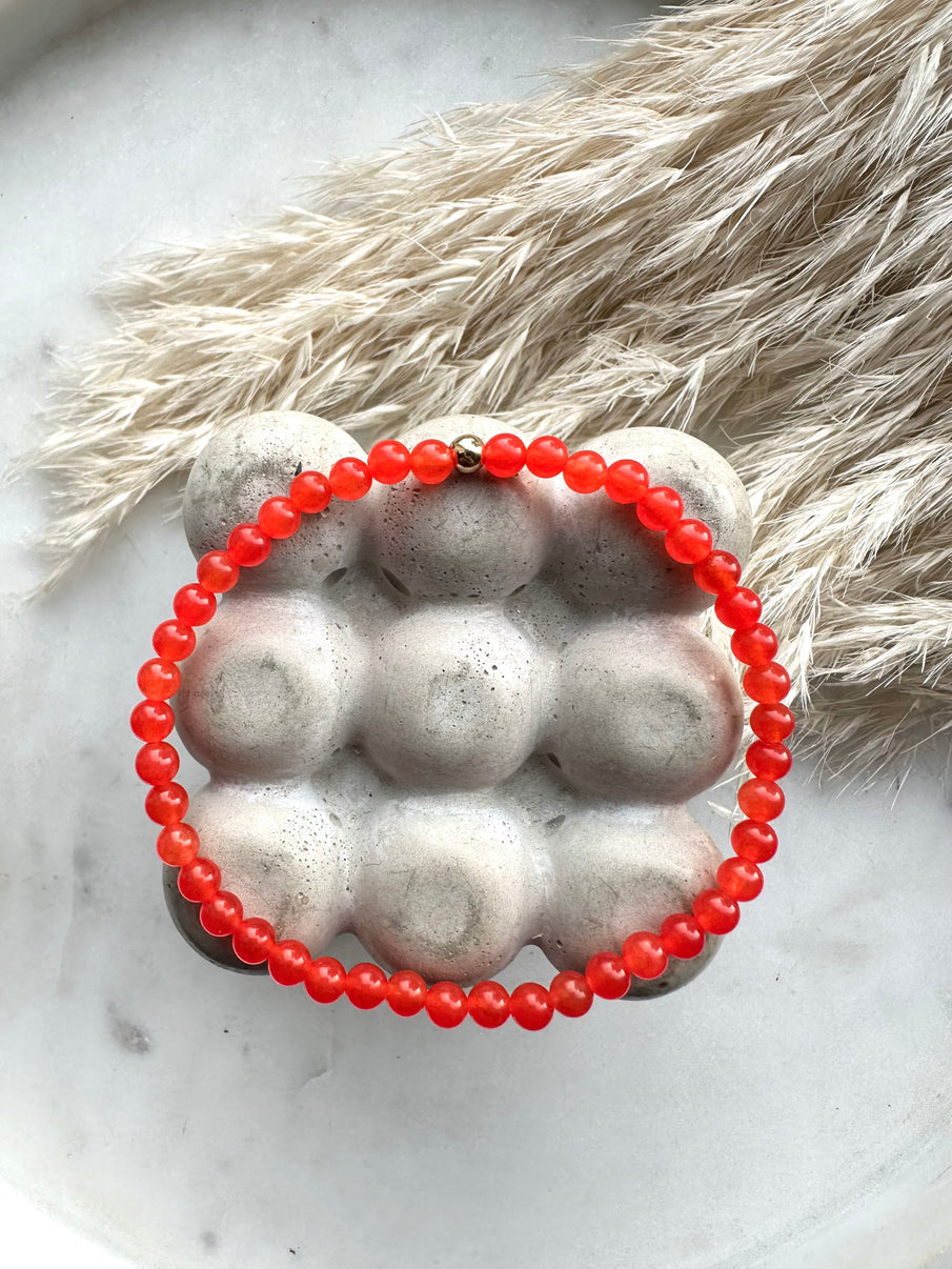 Beaded red jade
