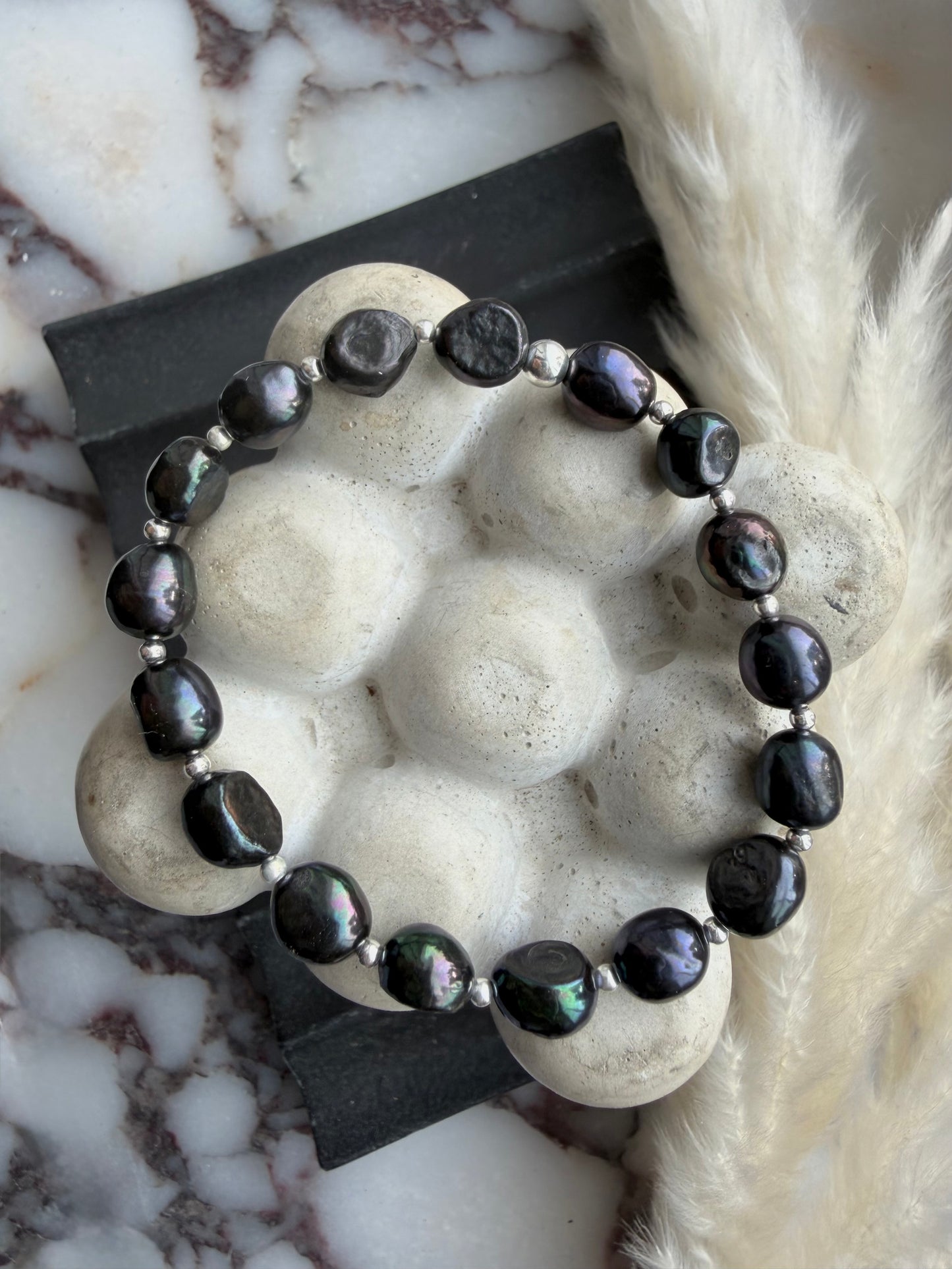 Peacock pearls