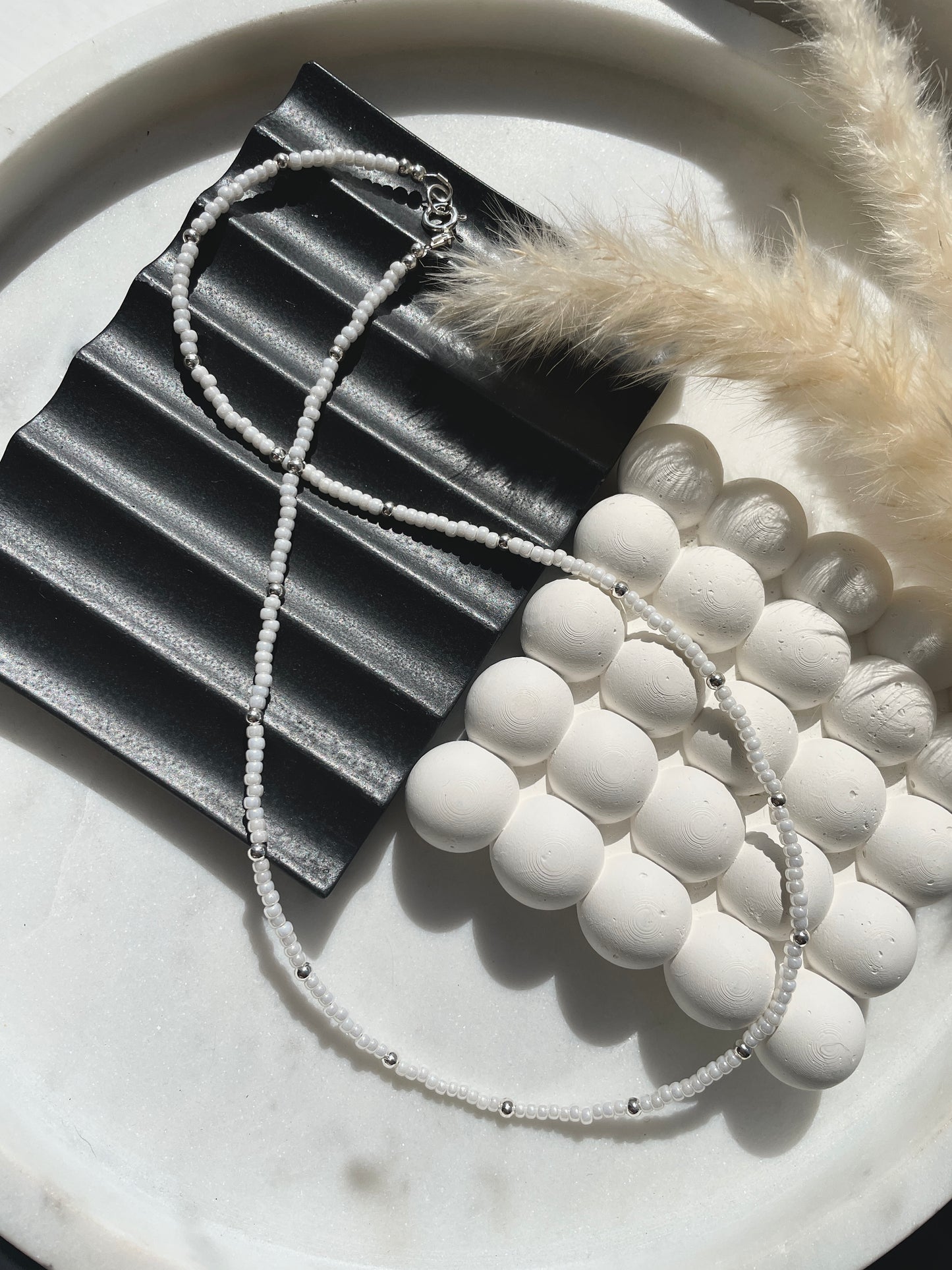 White pearlescent necklace