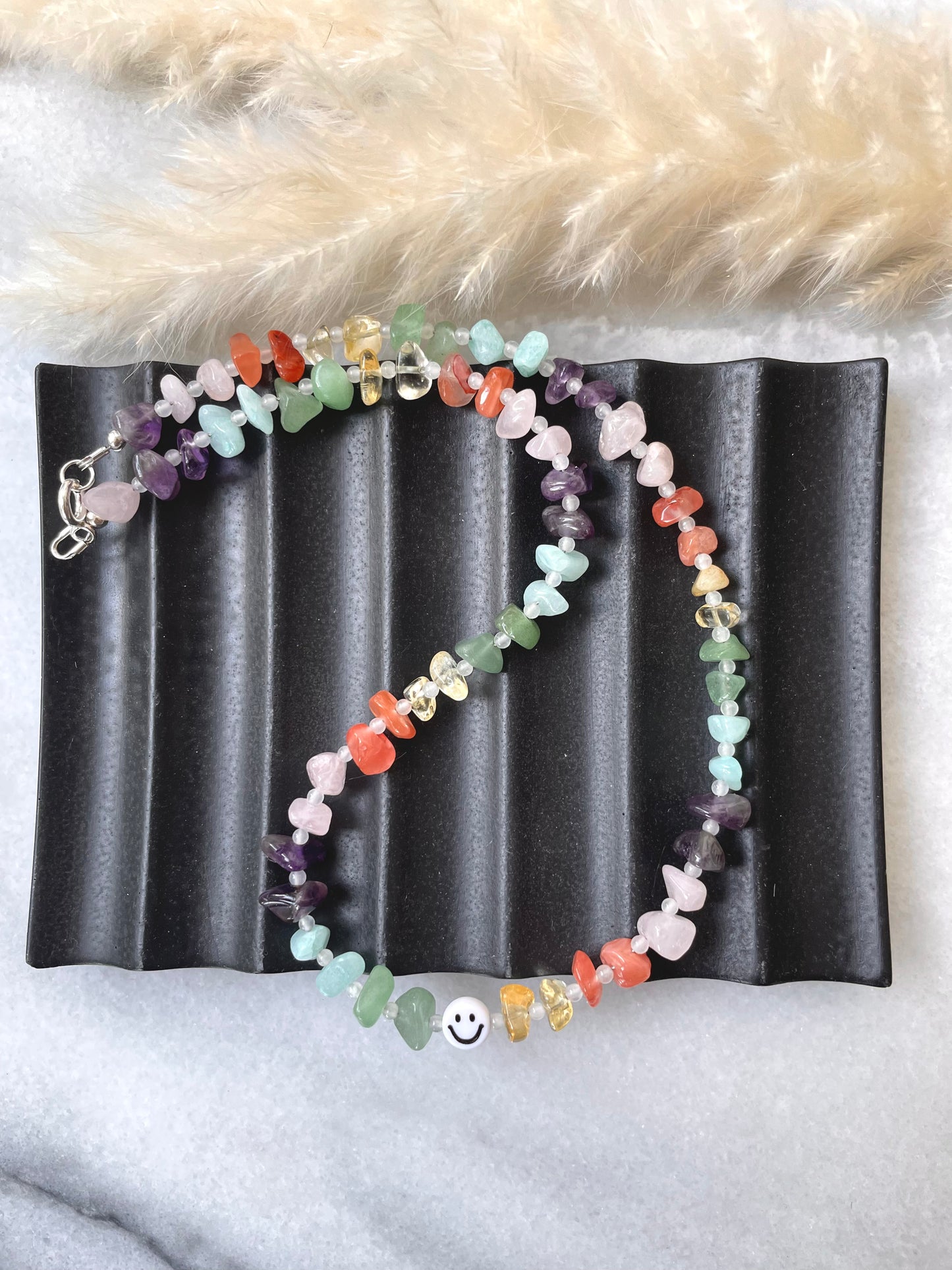 Rainbow crystal chip smiley necklace